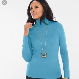 Lightweight ribbed knit turtleneck.